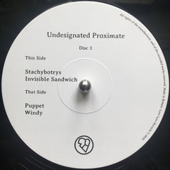 dgoHn Undesignated Proximate Love Love Records 3x12", Album Mint (M) Mint (M)