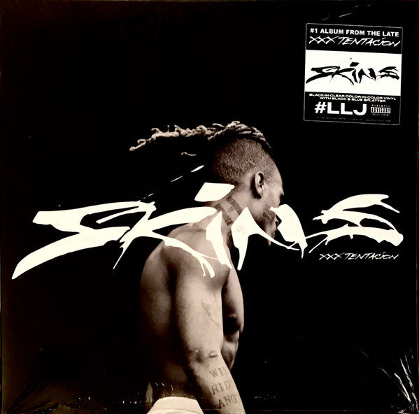 Skins (CLEAR + BLACK & BLUE SPLATTER VINYL) | Mint (M) Mint (M)