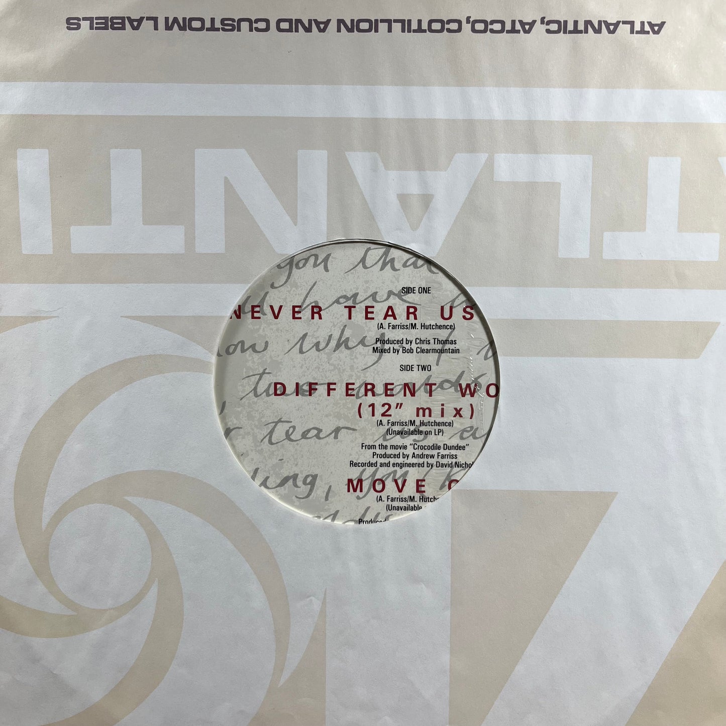 Never Tear Us Apart (VINYL) | Very Good Plus (VG+) Near Mint (NM) - NEW WAVE / USED *VERY GOOD+*