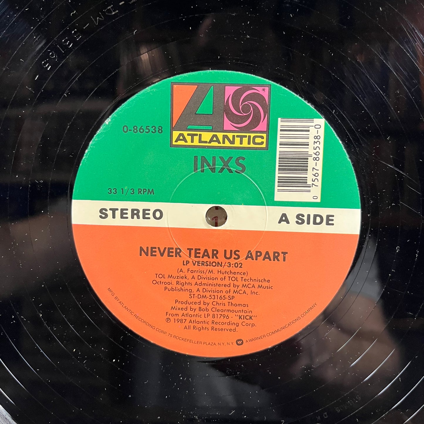 Never Tear Us Apart (VINYL) | Very Good Plus (VG+) Near Mint (NM) - NEW WAVE / USED *VERY GOOD+*