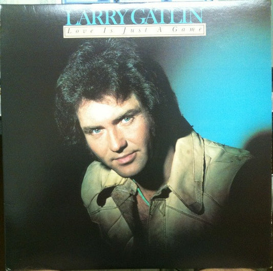 Larry Gatlin Love Is Just A Game Columbia LP, Album, RE Near Mint (NM or M-) Near Mint (NM or M-)
