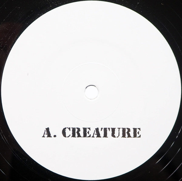 Creature 004 (YELLOW/BLACK SPLATTER 10" VINYL) | Mint (M) Mint (M) - MINIMAL *NEW/COLOR*