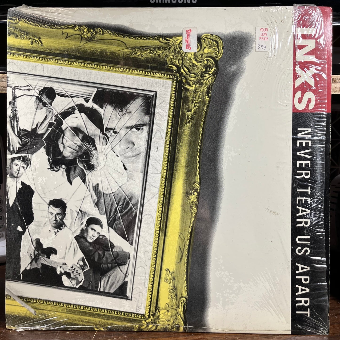 Never Tear Us Apart (VINYL) | Very Good Plus (VG+) Near Mint (NM) - NEW WAVE / USED *VERY GOOD+*