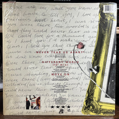 Never Tear Us Apart (VINYL) | Very Good Plus (VG+) Near Mint (NM) - NEW WAVE / USED *VERY GOOD+*