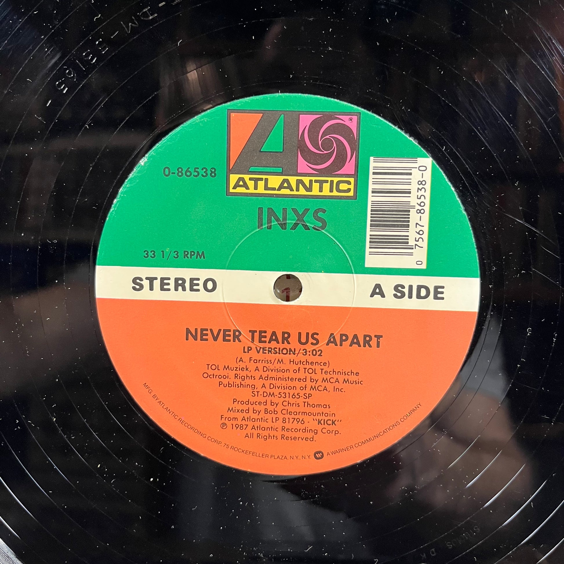 Never Tear Us Apart (VINYL) | Very Good Plus (VG+) Near Mint (NM) - NEW WAVE / USED *VERY GOOD+*