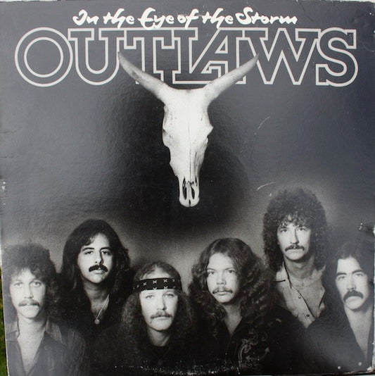 In The Eye Of The Storm | Near Mint (NM) Near Mint (NM) - ROCK / USED *NEAR MINT*