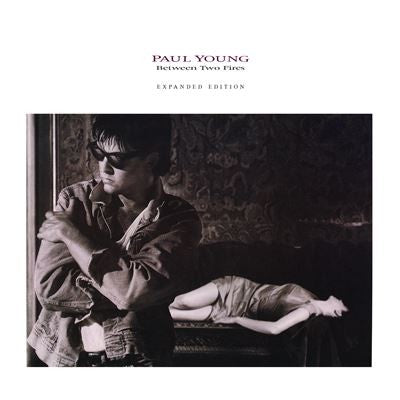 Paul Young - Between Two Fires (180G) [Flame Red Vinyl] [2LP] |