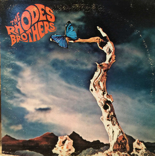 The Rhodes Brothers *SIGNED* | Excellent (EX) Near Mint (NM)