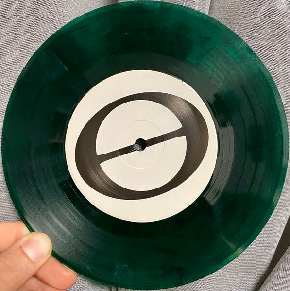 At Capacity (TRANSPARENT GREEN MARBLE VINYL 7") | Mint (M) Mint (M) - PUNK *NEW/COLOR*