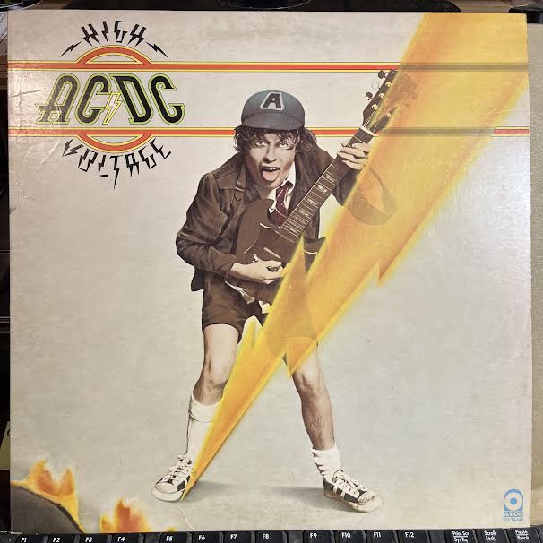 High Voltage (VINYL) | Excellent (EX) Excellent (EX) - ROCK / USED *EXCELLENT*