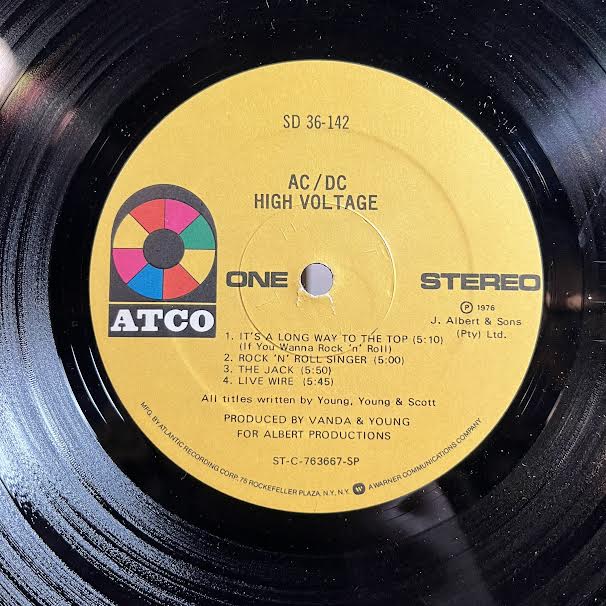 High Voltage (VINYL) | Excellent (EX) Excellent (EX) - ROCK / USED *EXCELLENT*