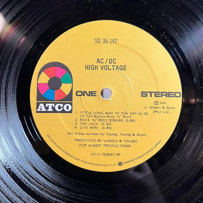 High Voltage (VINYL) | Excellent (EX) Excellent (EX) - ROCK / USED *EXCELLENT*